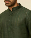 alt message - Manyavar Men Dark Green Self Patterned Kurta image number 1